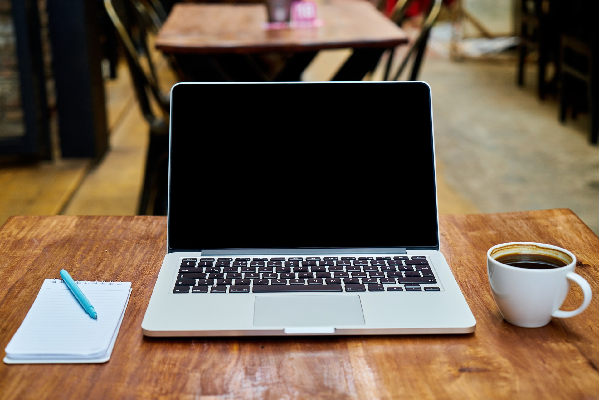 Laptop with Notebook and Coffee